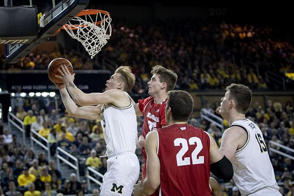 Charles Matthews (1) and Jon Teske (15)