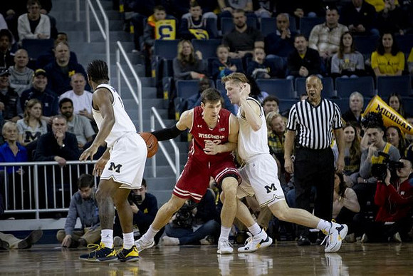 Zavier Simpson (3) and Ignas Brazdeikis (13)