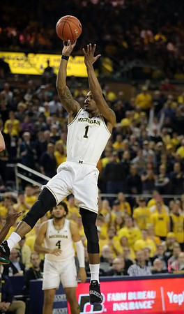 Charles Matthews (1) and Isaiah Livers (4)