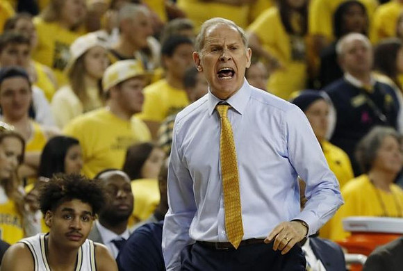 Jordan Poole (2) and John Beilein