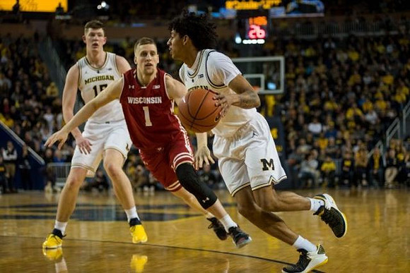 Jon Teske (15) and Eli Brooks (55)