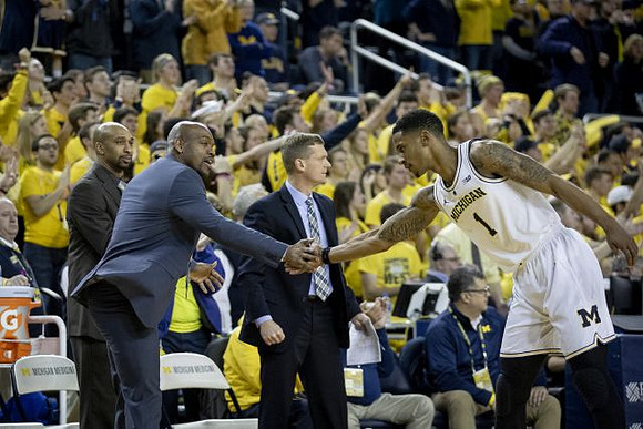 Saddi Washington, Deandre Haynes, Luke Yaklich, and Charles Matthews (1)