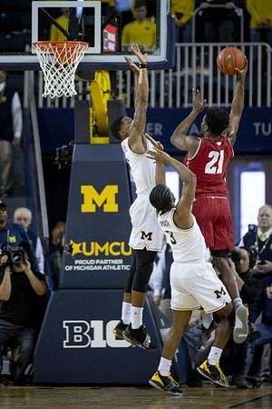 Charles Matthews (1) and Zavier Simpson (3)