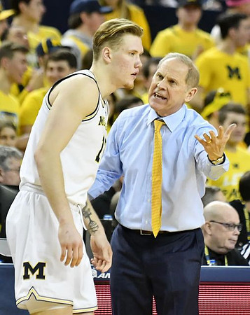 Ignas Brazdeikis (13) and John Beilein