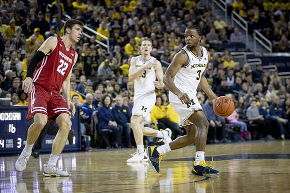Ignas Brazdeikis (13) and Zavier Simpson (3)