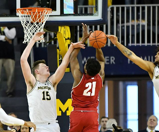 Jon Teske (15) and Isaiah Livers (4)