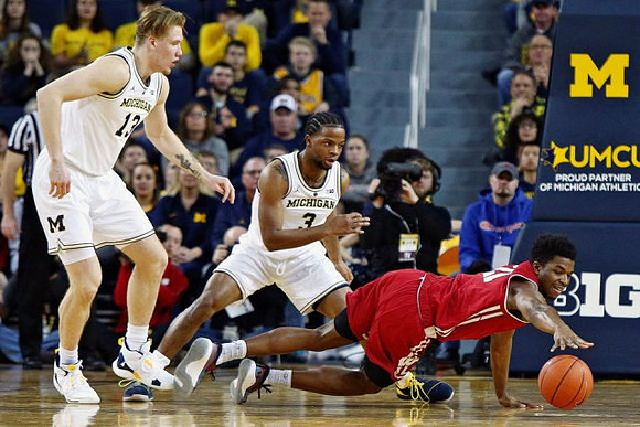Ignas Brazdeikis (13) and Zavier Simpson (3)