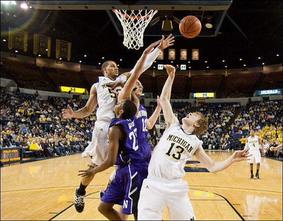Jordan Morgan (52), Matt Vogrich (13), and Darius Morris (4)