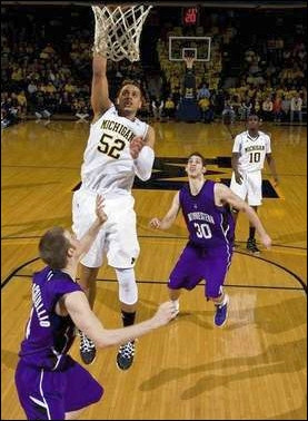 Jordan Morgan (52) and Tim Hardaway Jr. (10)