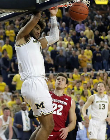 Isaiah Livers (4) and Ignas Brazdeikis (13)