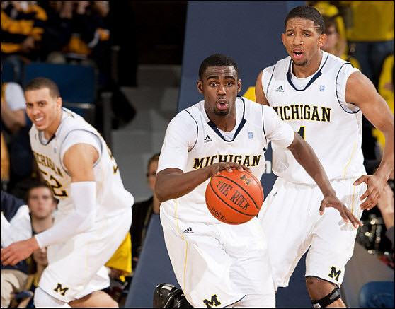 Jordan Morgan (52), Tim Hardaway Jr. (10), and Darius Morris (4)