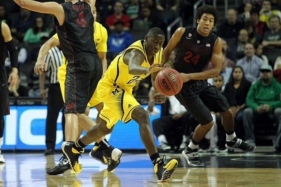 Jordan Morgan (52) and Caris LeVert (23)