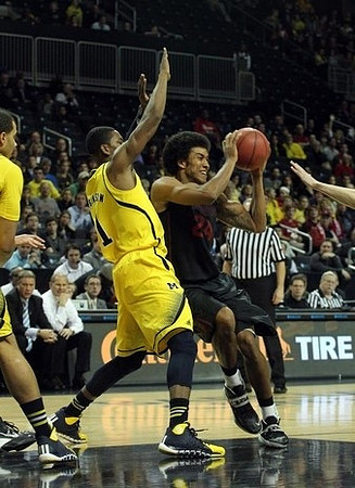 Jordan Morgan (52) and Glenn Robinson III (1)