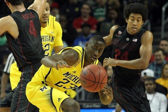 Jordan Morgan (52) and Caris LeVert (23)