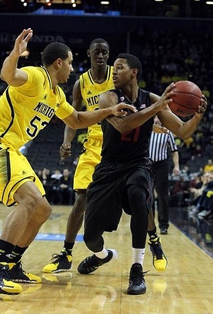Jordan Morgan (52) and Caris LeVert (23)