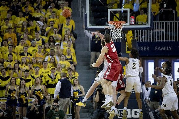 Jordan Poole (2), Zavier Simpson (3), and Charles Matthews (1)