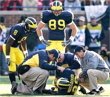 Tim Massaquoi, Lloyd Carr, Jason Avant, and Tyler Ecker