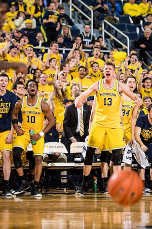 Sean Lonergan (20), Derrick Walton Jr. (10), Moritz Wagner (13), and Mark Donnal (34)