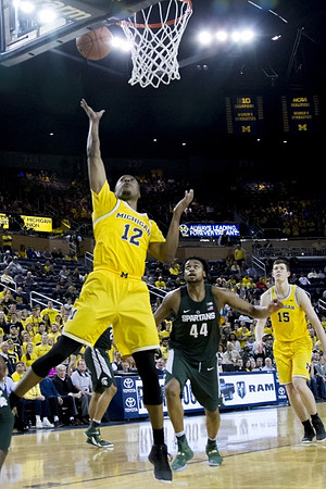 Muhammad-Ali Abdur-Rahkman (12) and Jon Teske (15)