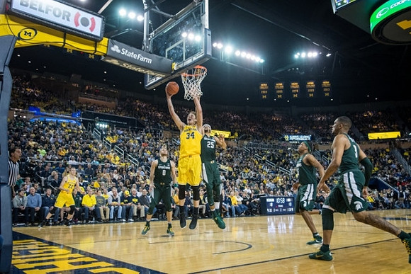 Duncan Robinson (22) and Mark Donnal (34)