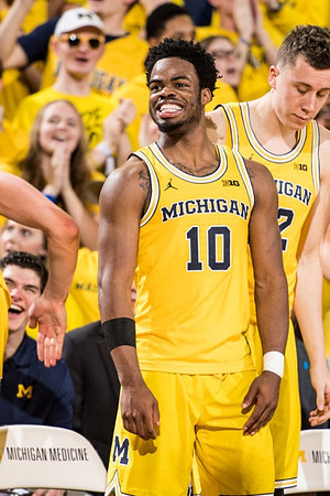 Derrick Walton Jr. (10) and Duncan Robinson (22)