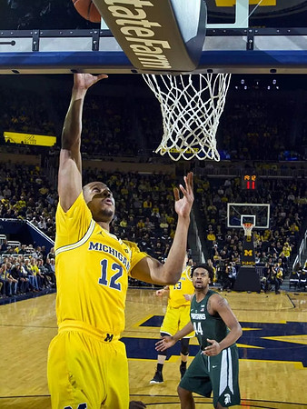 Muhammad-Ali Abdur-Rahkman (12) and Moritz Wagner (13)