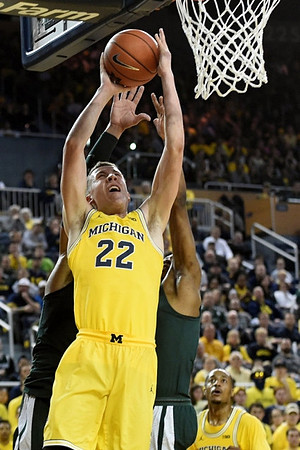 Duncan Robinson (22) and Muhammad-Ali Abdur-Rahkman (12)
