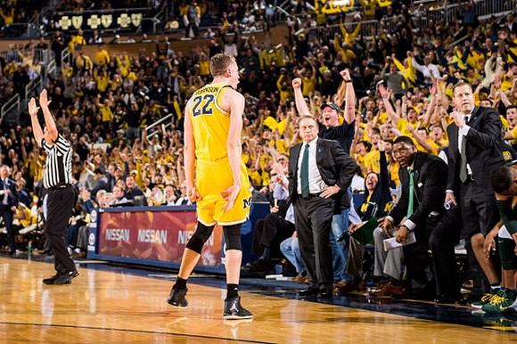 Duncan Robinson (22) and Michigan State Head Coach Tom Izzo