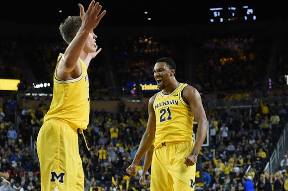 Moritz Wagner (13) and Zak Irvin (21)