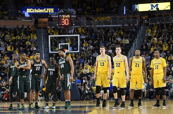 Moritz Wagner (13), Duncan Robinson (22), Zak Irvin (21), and Muhammad-Ali Abdur-Rahkman (12)
