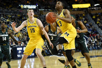 Jon Teske (15) and Xavier Simpson (3)