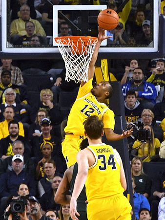 Muhammad-Ali Abdur-Rahkman (12) and Mark Donnal (34)