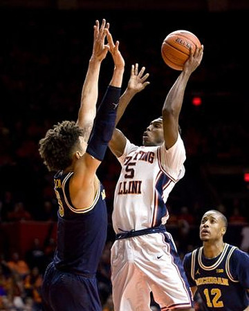 D.J. Wilson (5) and Muhammad-Ali Abdur-Rahkman (12)