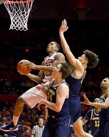 Mark Donnal (34), D.J. Wilson (5), Muhammad-Ali Abdur-Rahkman (12), and Zak Irvin (21)