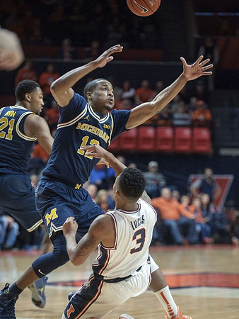 Muhammad-Ali Abdur-Rahkman (12) and Zak Irvin (21)