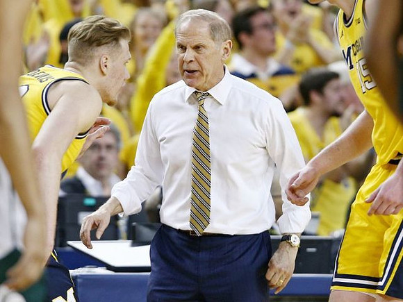 Ignas Brazdeikis (13), John Beilein, and Jon Teske (15)