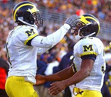 Marquise Walker (4) and B.J. Askew (35)