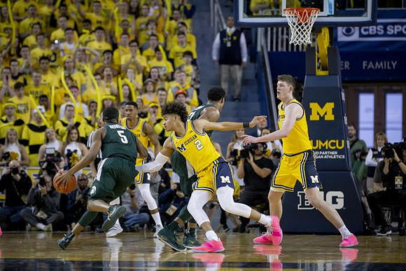 Charles Matthews (1), Jordan Poole (2), and Jon Teske (15)