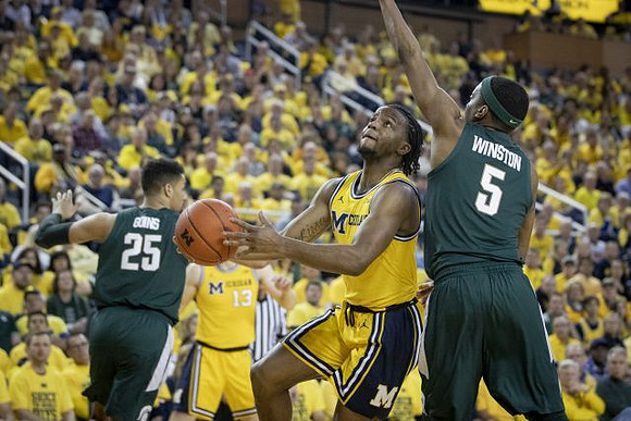 Ignas Brazdeikis (13) and Zavier Simpson (3)