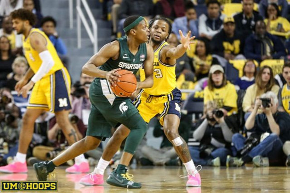 Isaiah Livers (4) and Zavier Simpson (3)