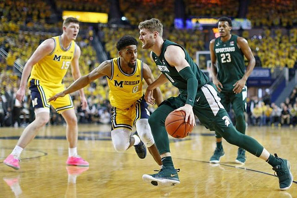 Jon Teske (15) and David DeJulius (0)