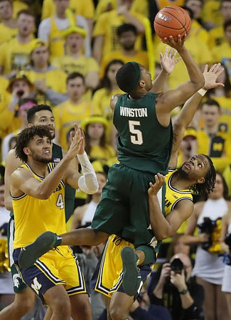 Isaiah Livers (4) and Zavier Simpson (3)