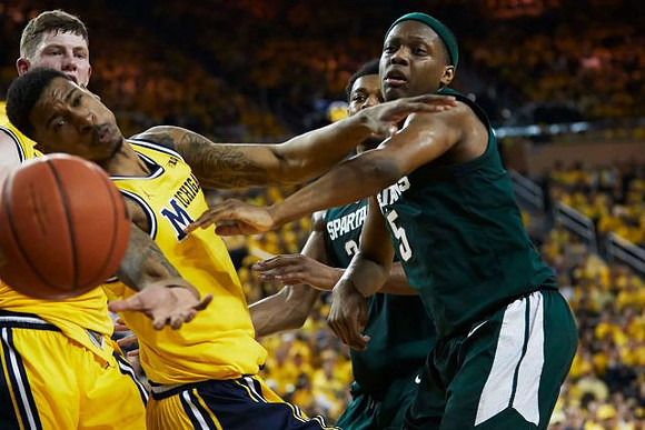 Charles Matthews (1) and Jon Teske (15)