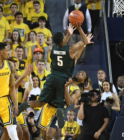 Charles Matthews (1) and Zavier Simpson (3)
