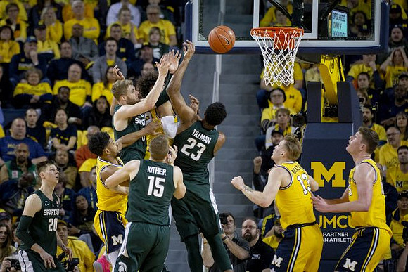 David DeJulius (0), Ignas Brazdeikis (13), and Jon Teske (15)