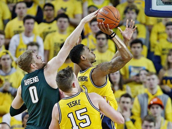 Jon Teske (15) and Charles Matthews (1)