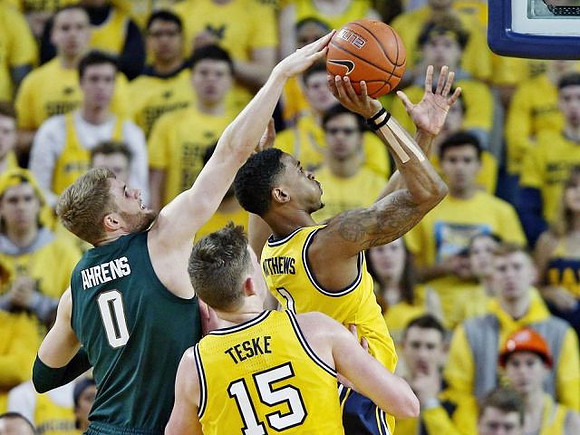 Jon Teske (15) and Charles Matthews (1)