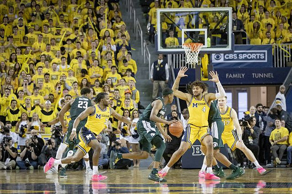 Zavier Simpson (3), Isaiah Livers (4), and Ignas Brazdeikis (13)