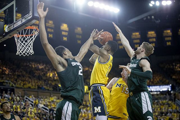 Charles Matthews (1) and Jon Teske (15)