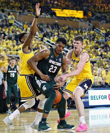 Charles Matthews (1) and Jon Teske (15)